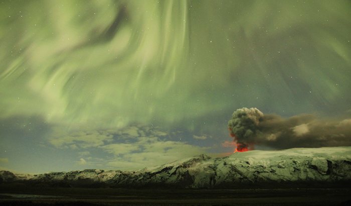 The Northern Lights are seen above the ash plume of Iceland's Eyjafjallajokull volcano in the evening.   REUTERS/Lucas Jackson/Files