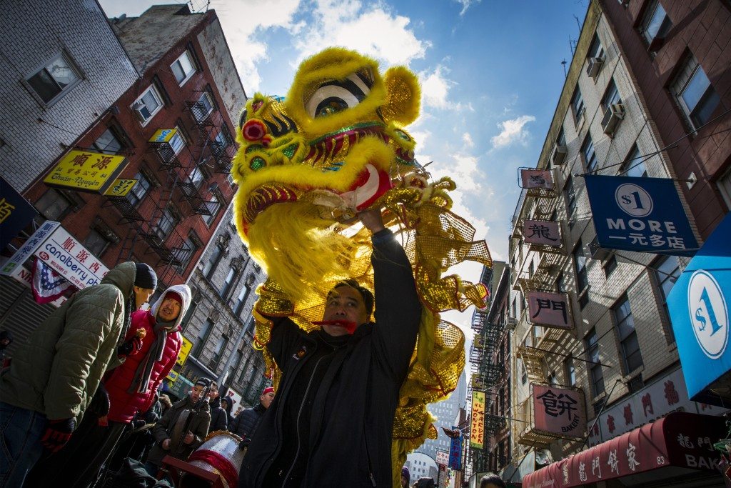 Performers present a lion dance during Chinese Lunar New Year celebrations 2015. REUTERS/Brendan McDermid 
