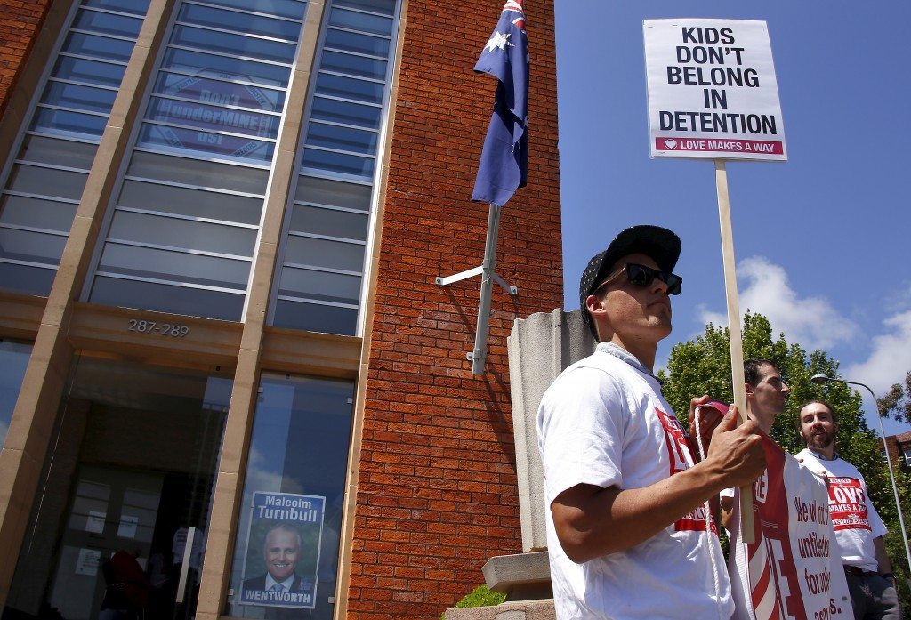 Protesters stand outside and occupy Australian PM Turnbull's electoral office, as they demand end to policy of offshore detention of asylum seekers, in Sydney suburb of Edgecliff. REUTERS/David Gray