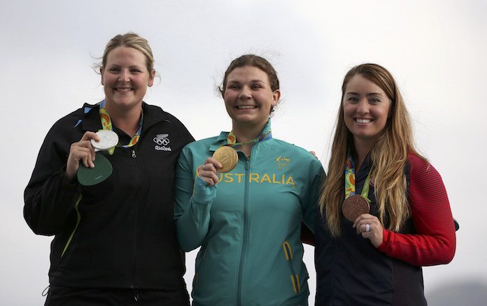 2016 Rio Olympics - Shooting - Victory Ceremony - Women's Trap Victory Ceremony - Olympic Shooting Centre - Rio de Janeiro, Brazil - 07/08/2016. (L-R) Natalie Rooney (NZL) of New Zealand, Catherine Skinner (AUS) of Australia and Corey Cogdell (USA) of USA pose with their medals.  REUTERS/Edgard Garrido  