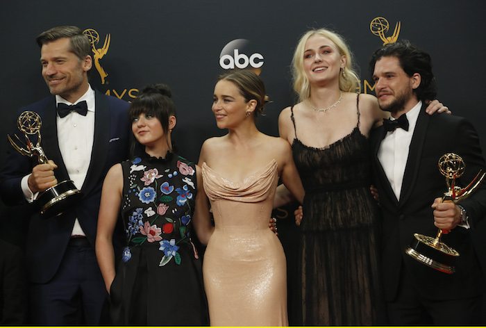 Nikolaj Coster-Waldau (L), Maisie Williams, Emilia Clarke, Sophie Turner and Kit Harrington of HBO's "Game of Thrones" pose backstage with their award for Oustanding Drama Series at the 68th Primetime Emmy Awards in Los Angeles, California U.S., September 18, 2016.   REUTERS/Mario Anzuoni