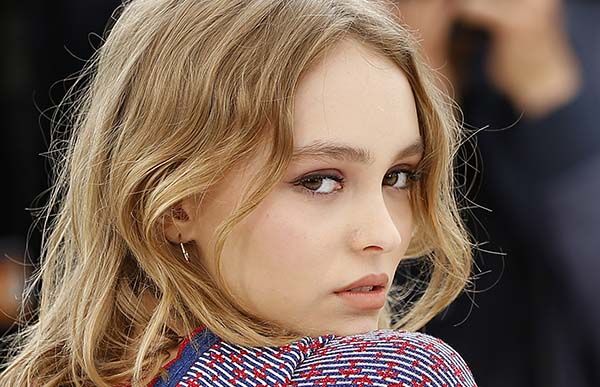 Lily-Rose Depp poses during a photocall for the film "La danseuse" at the 69th Cannes Film Festival in Cannes.