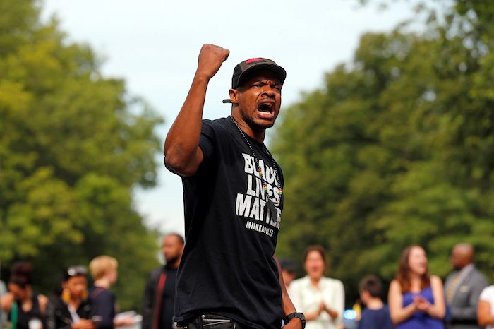 Marques Armstrong chants in support of Philando Castile, who was fatally shot by Minneapolis area police during a traffic stop on Wednesday, at a "Black Lives Matter" demonstration, in front of the Governor's Mansion in St. Paul, Minnesota, U.S., July 7, 2016.  REUTERS/Eric Miller 