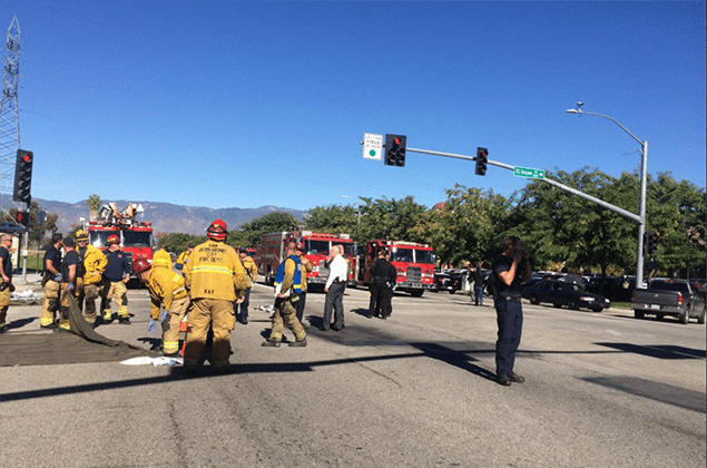 Police officers and firefighters at the scene in San Bernardino. PHOTO: TWITTER/LA TIMES