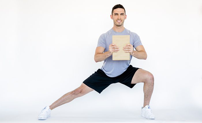 For a simple side lunge, stand with feet together. With right leg straight, step to the side with the left, bending at left knee. Push off with left leg to return to start.
