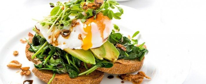 Rye Toast with Poached Free-Range Eggs, Wilted Spinach, Avocado and Sprouts